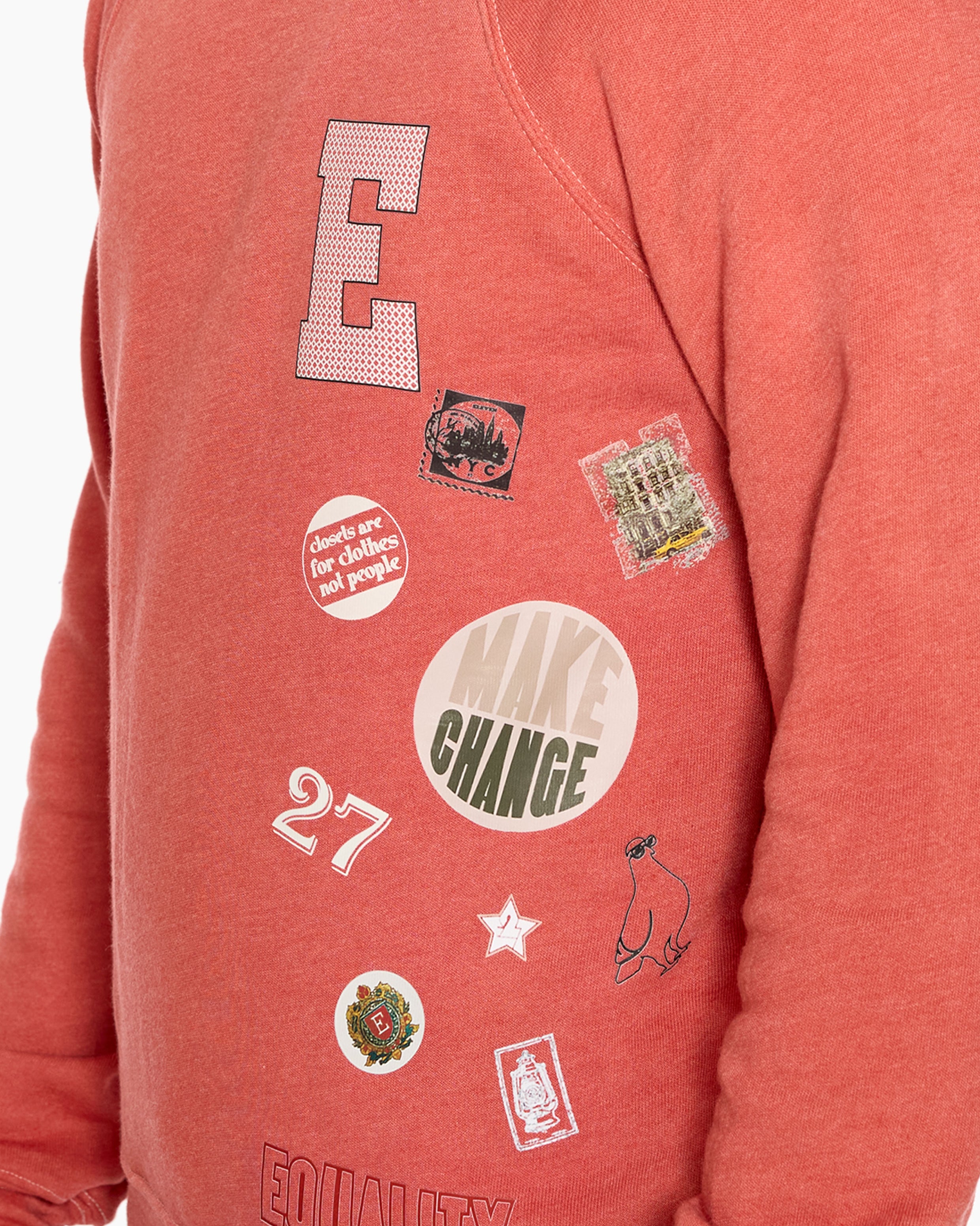 Orange Eleven27 sweatshirt with various graphics and text on a white background