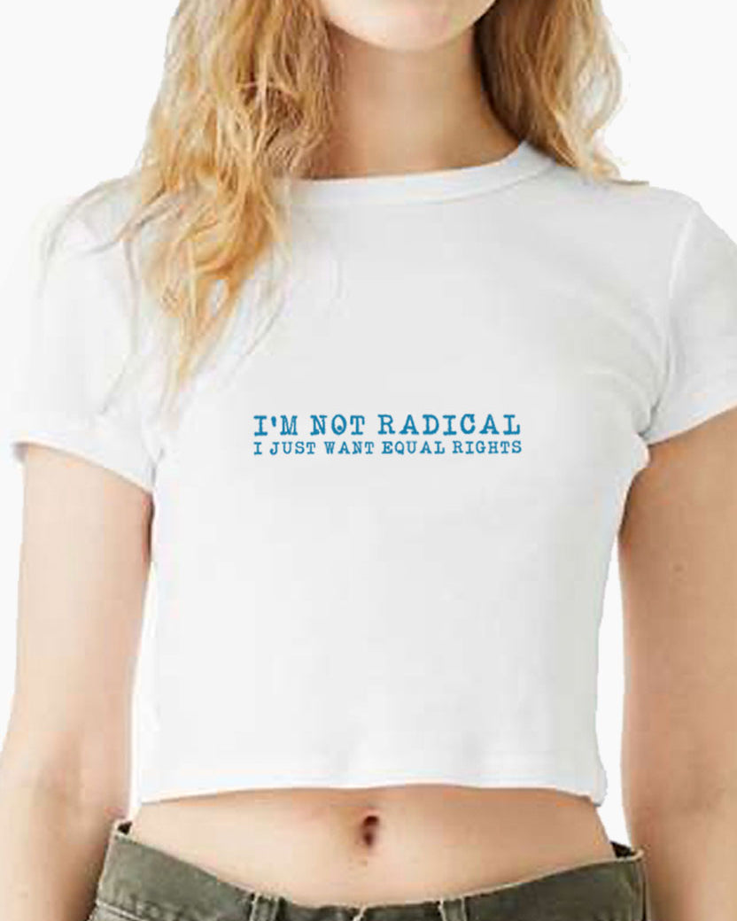 Person wearing a white Eleven27 baby tee with text 'I'M NOT RADICAL I JUST WANT EQUAL RIGHTS'.