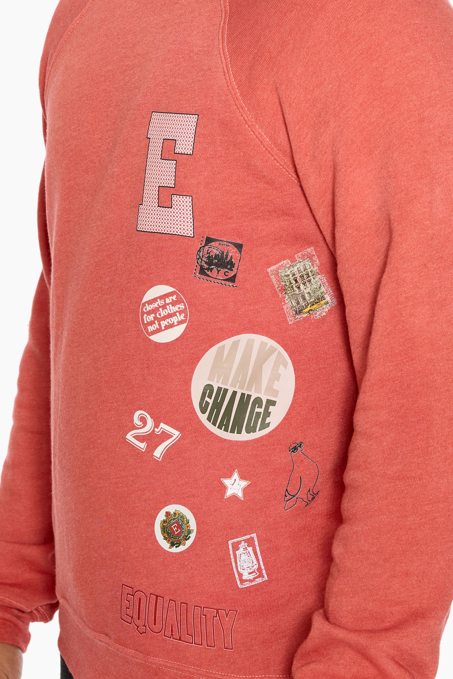 Orange Eleven27 sweatshirt with various graphics and text on a white background
