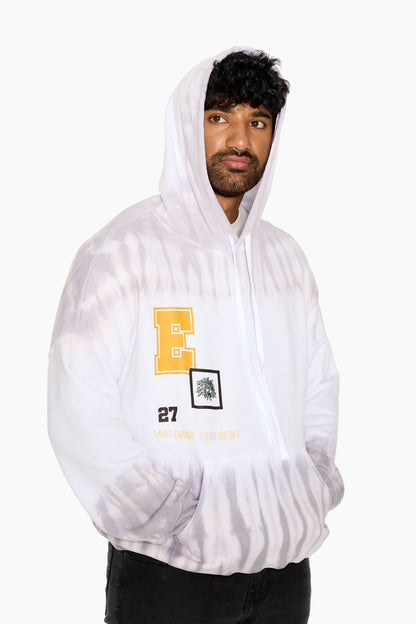 Eleven27 white hoodie with grey tie dye and patch-style graphics on the front