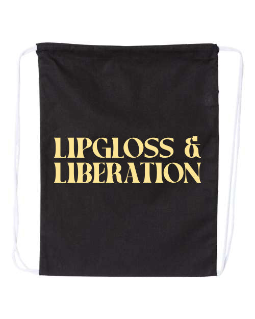 Black drawstring bag with 'Lipgloss & Liberation' text in butter yellow on a white background