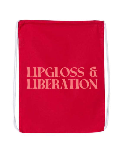 Red drawstring bag with 'Lipgloss & Liberation' coral text on a white background