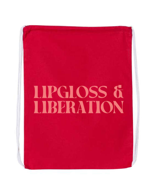 Red drawstring bag with 'Lipgloss & Liberation' coral text on a white background