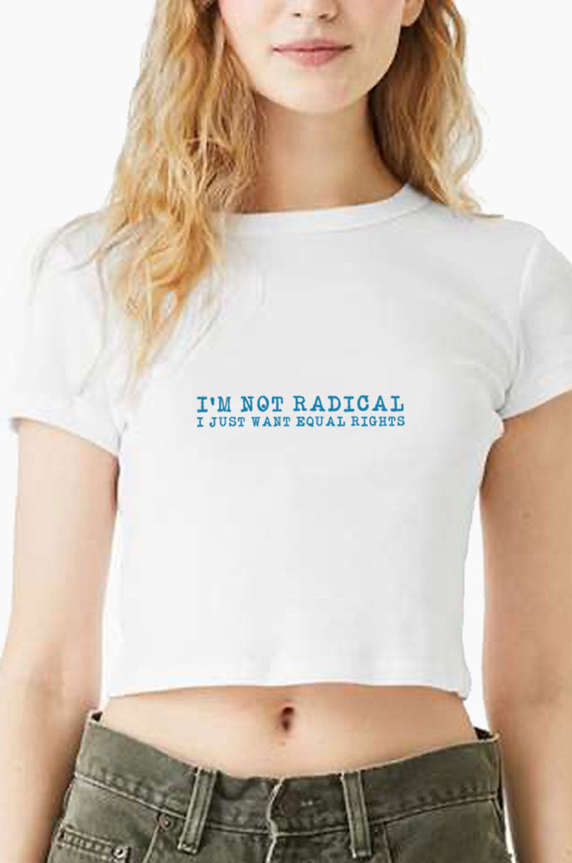 Person wearing a white Eleven27 baby tee with text 'I'M NOT RADICAL I JUST WANT EQUAL RIGHTS'.