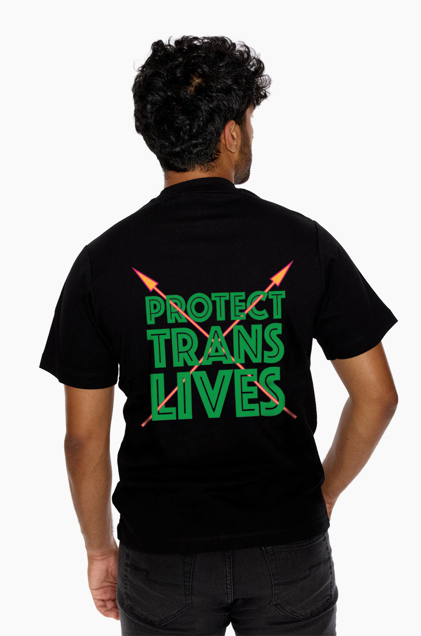 Person wearing a black t-shirt with 'PROTECT TRANS LIVES' text on the back.